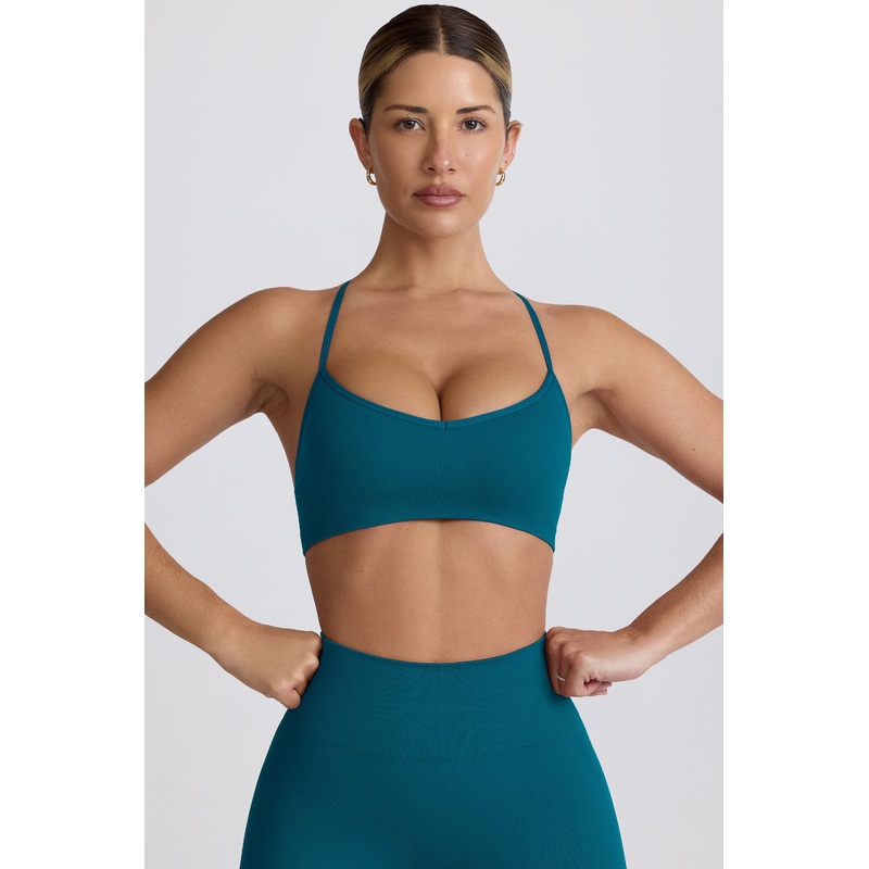 Super Sculpt Seamless Cross-Back Sports Bra in Teal
