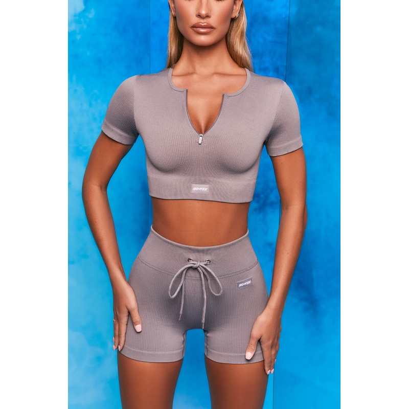 Perform Ribbed Short Sleeve Zip Front Crop Top in Dark Grey