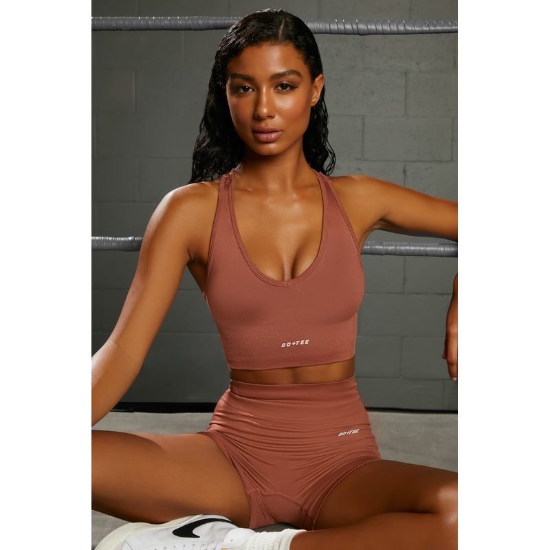 Overhaul Racer Knot Back Seamless Crop Top in Rust