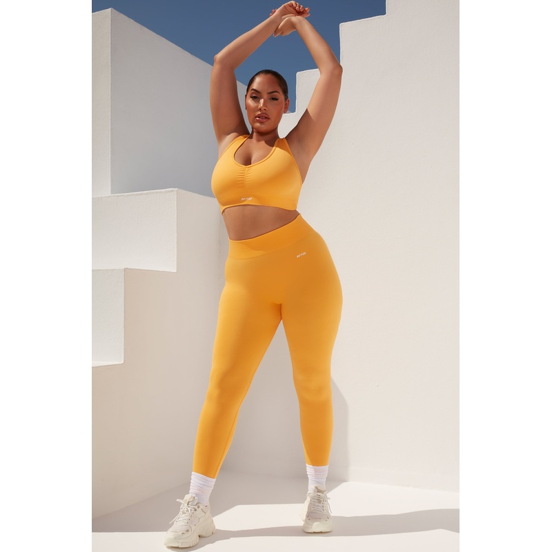 Surge Petite Curved Waist Seamless Leggings in Light Orange
