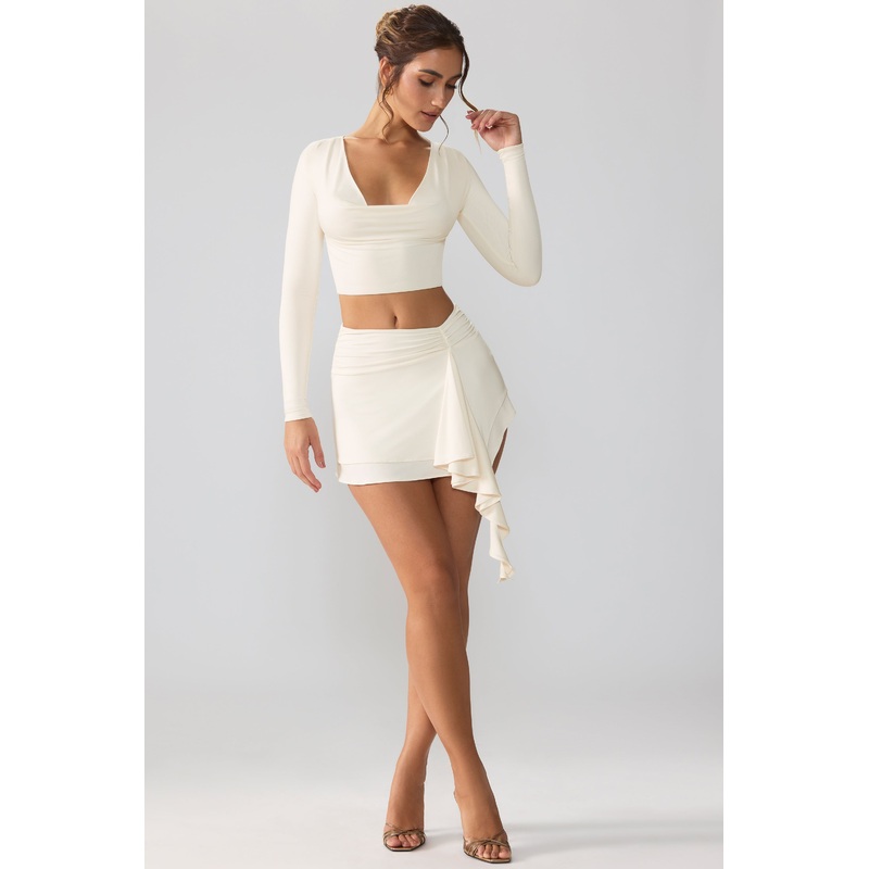 Slinky Jersey Mid Rise Ruffle Layer Mini Skirt in Ivory