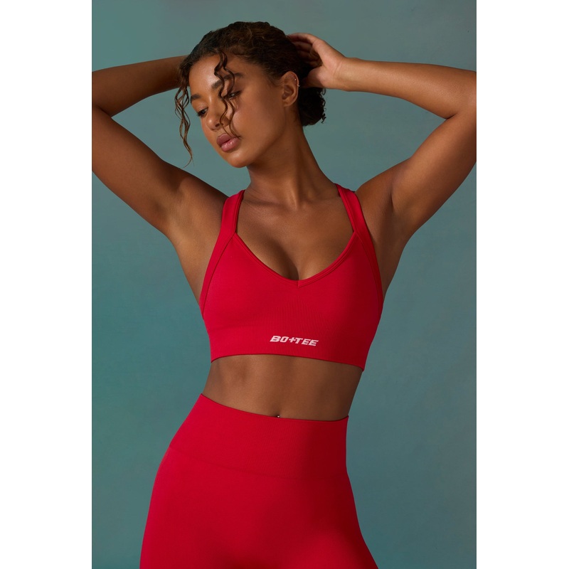 Super Sculpt Seamless Cross Back Sports Bra in Tango Red