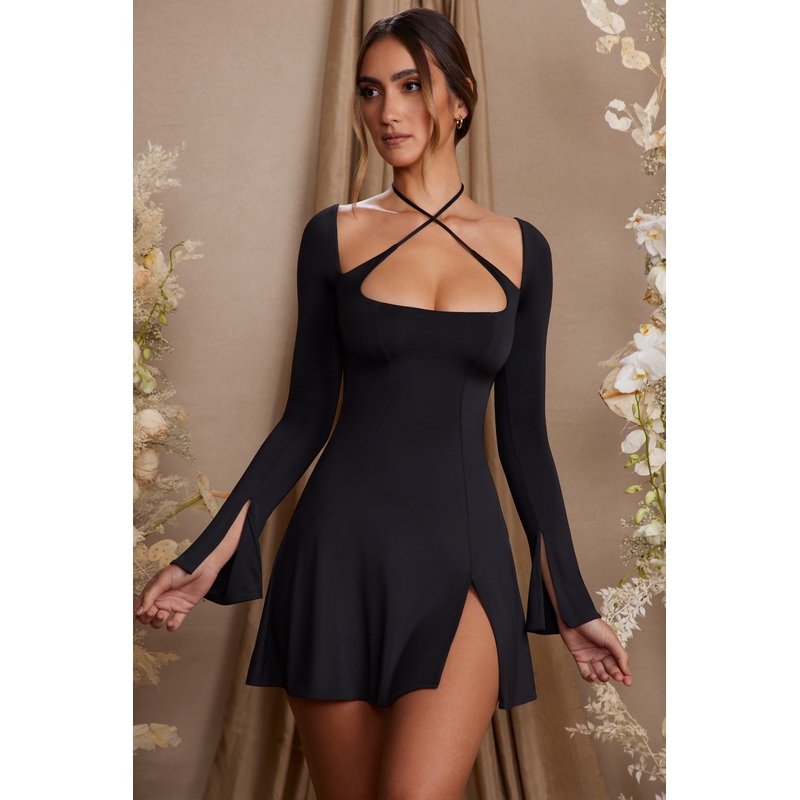 Long Sleeve Cross Over Strap Mini Dress in Black