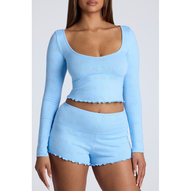 Long Sleeve Scoop Neck Pointelle Crop Top in Baby Blue
