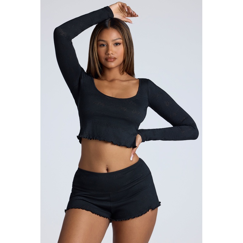 Mid Rise Pointelle Mini Shorts in Black