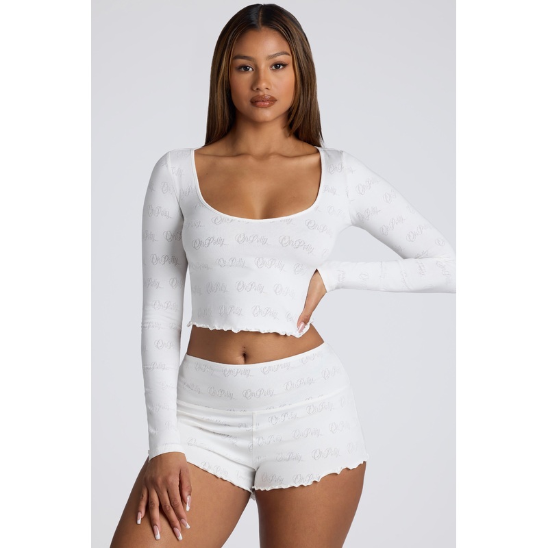 Mid Rise Pointelle Mini Shorts in White