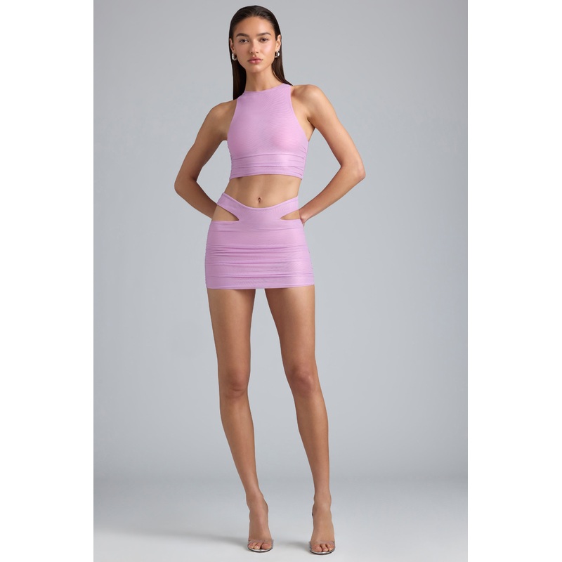 Metallic Cut-Out Low-Rise Mini Skirt in Violet Pink