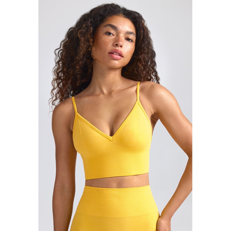 Define Luxe V-Neck Sports Bra in Golden Yellow