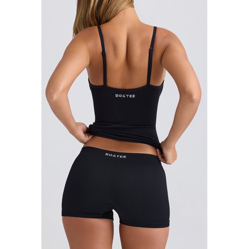 Super Sculpt Seamless Mid-Rise Mini Shorts in Black